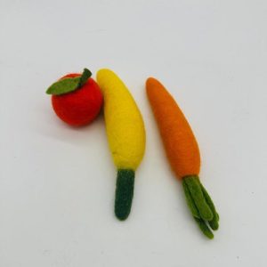 A handmade felt turtle pet toy with a green body and yellow shell spots, featuring small white eyes.