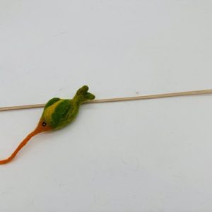 A handmade felt turtle pet toy with a green body and yellow shell spots, featuring small white eyes.