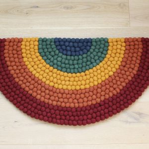Handmade felt rug and decor items.