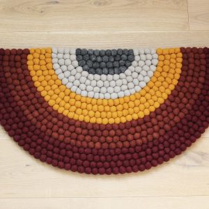 Handmade felt rug and decor items.