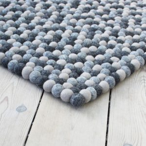 Handmade felt rug and decor items.