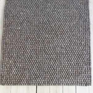 Handmade felt rug and decor items.