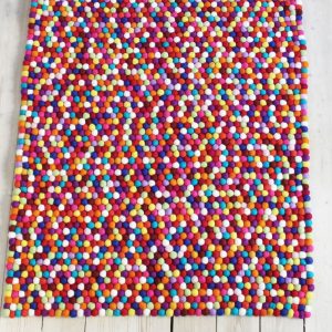 Handmade felt rug and decor items.