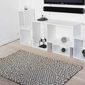 Handmade felt rug and decor items.