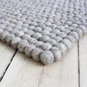 Handmade felt rug and decor items.