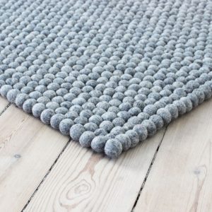 Handmade felt rug and decor items.