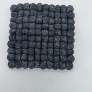 Handcrafted felt decor piece for kitchens and home spaces.