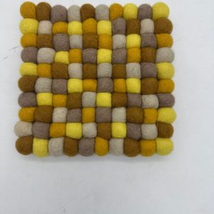 Handcrafted felt decor piece for kitchens and home spaces.