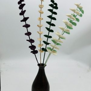 Handmade felt flower with layered petals.