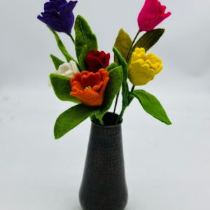 Handmade felt flower with layered petals.