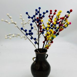 Handmade felt flower with layered petals.