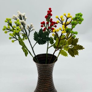 Handmade felt flower with layered petals.