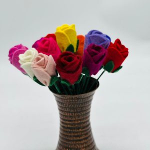 Handmade felt flower with layered petals.