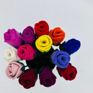 Handmade felt flower with layered petals.