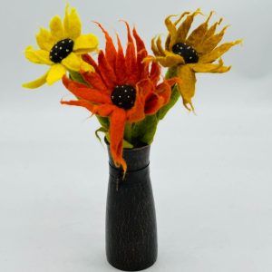 Handmade felt flower with layered petals.