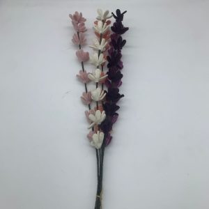 Handmade felt flower with layered petals.